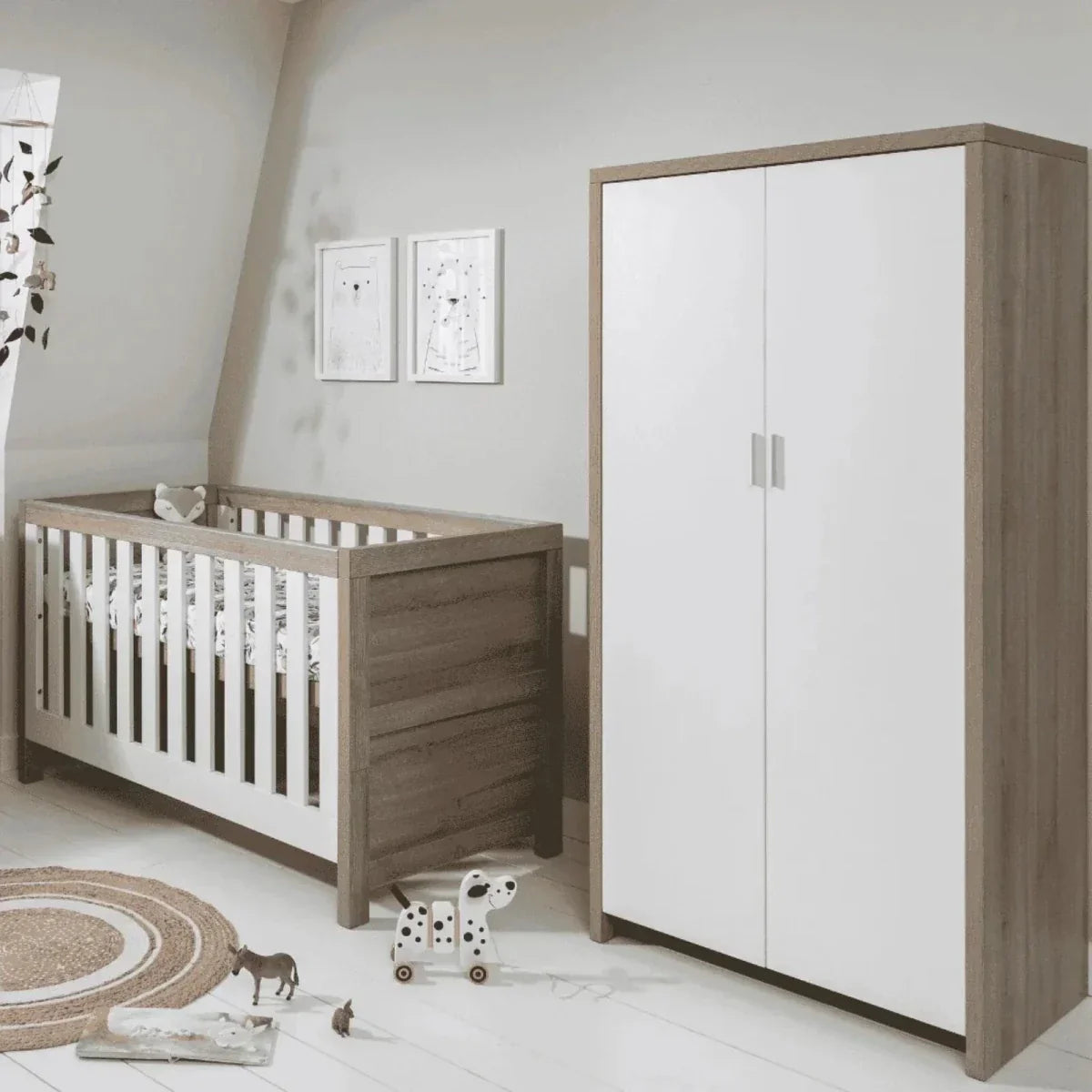Tutti Bambini Modena Wardrobe in White and Oak finish standing in a bright nursery, showing the two-door design with soft-close mechanism and clean Scandinavian aesthetic