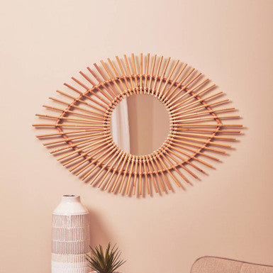 The Mirror That Makes a Wall – Orsina Mataram Rattan Eye Shape Wall Mirror for £70.95