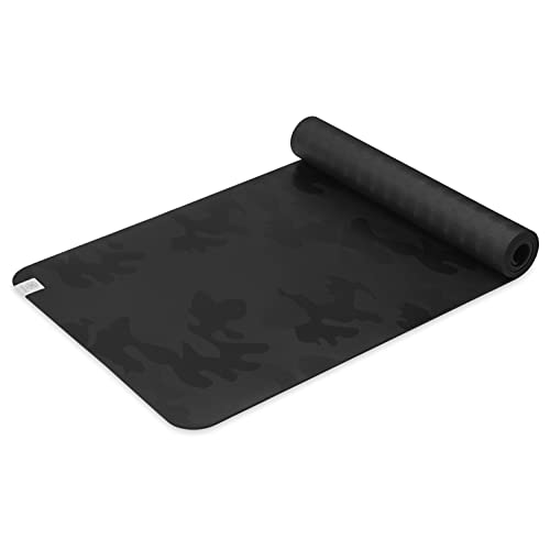 Gaiam Dry-Grip Yoga Mat 5mm thick non-slip hot yoga and fitness mat shown rolled out in a studio setting displaying the stay-dry topcoat surface and full 68 by 24 inch dimensions