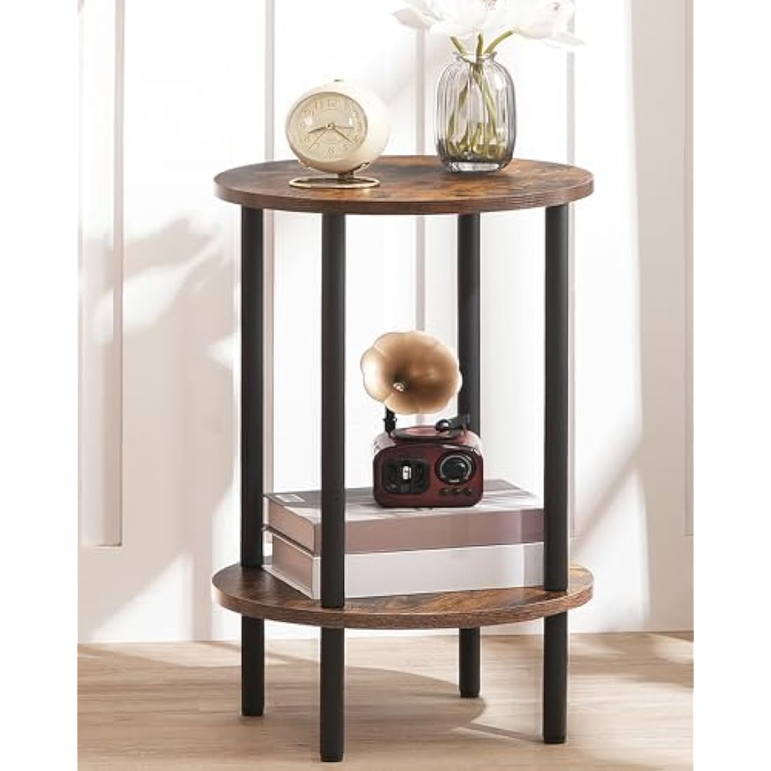 CHOEZON 2-Tier Round Side Table in rustic brown and black industrial metal frame styled in a living room corner with a plant and books