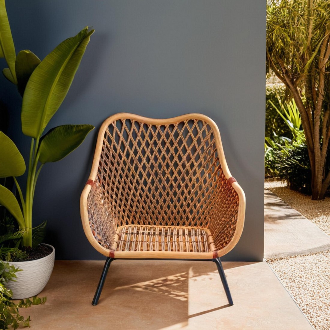 Where Industrial Edge Meets Artisan Warmth – Orsina Manado Black Iron & Rattan Accent Chair for £184.95