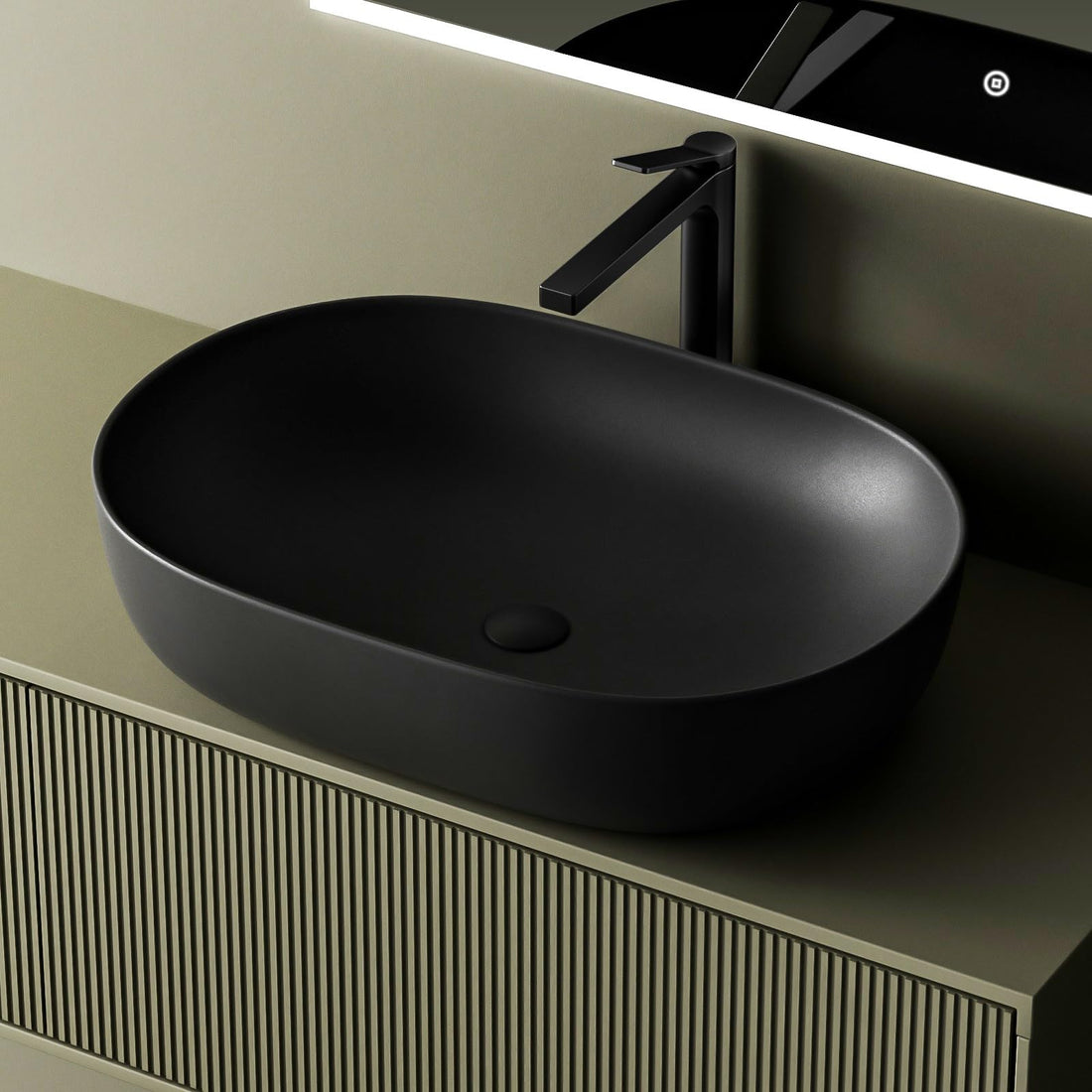 EMKE Oval Countertop Sink in matte black ceramic — 60x41x13cm scratch-resistant bathroom basin with dirt-repellent surface and DIN standard drain compatibility for modern vanity setups