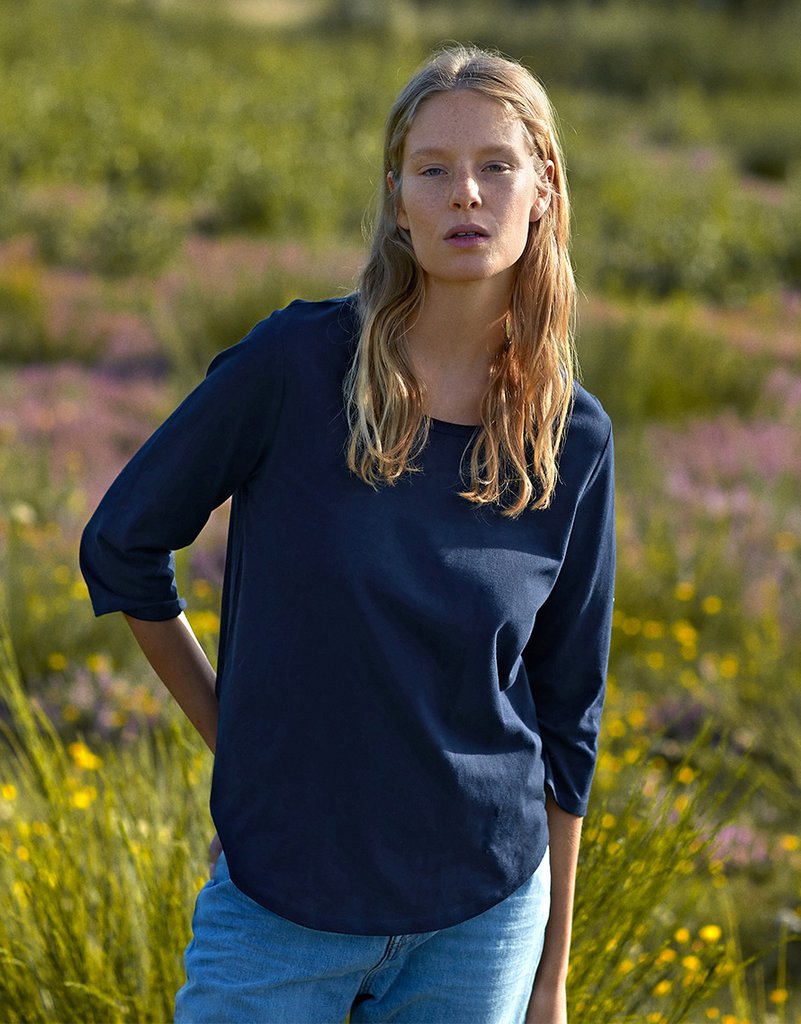 Fairtrade Organic Loose 3/4 Sleeve T-shirt in neutral — relaxed fit, scoop neck, worn casually outdoors
