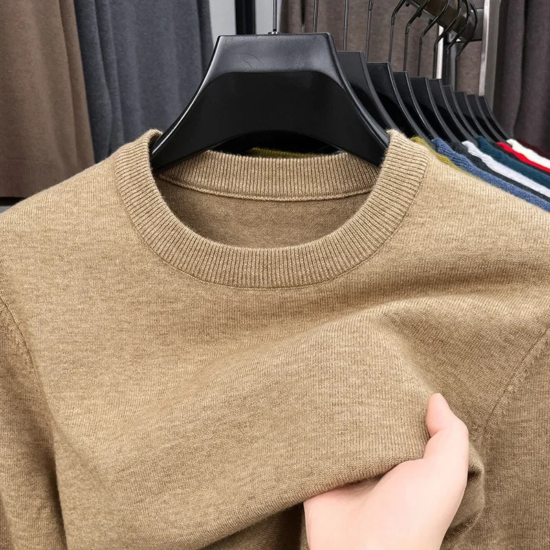 Men's Classic Knit Sweater round neck long sleeve casual pullover in a solid colour showing the clean minimalist design and regular fit for autumn winter wear