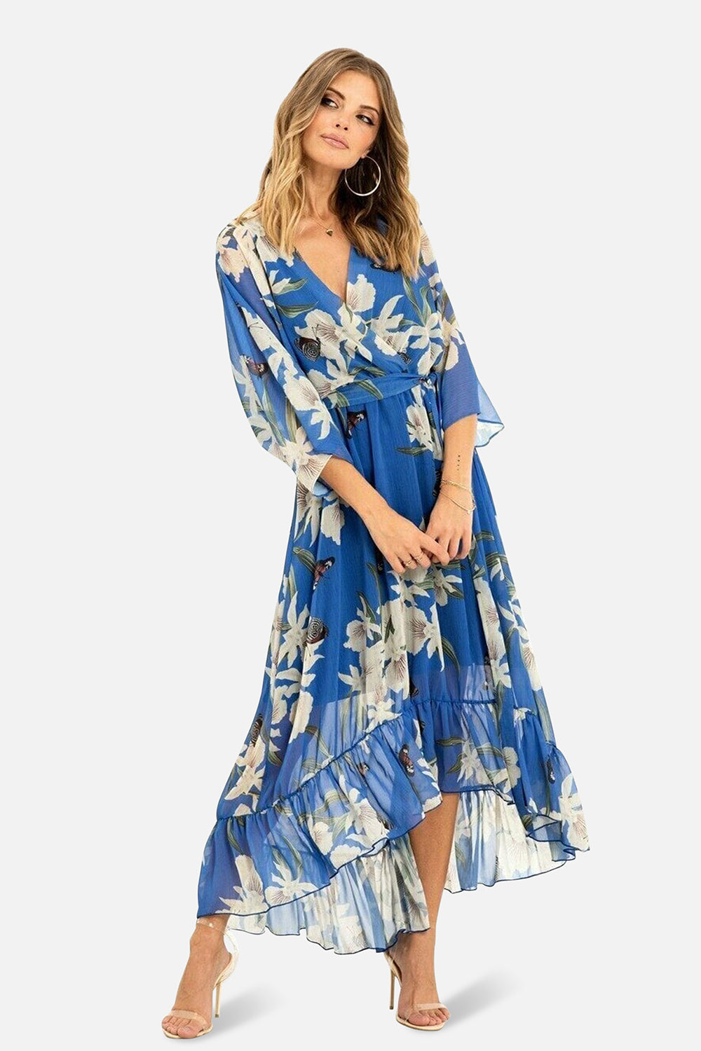 Yumi Blue Floral Kimono Sleeves Dip Hem Wrap Midi Dress — front view showing the stunning blue floral print, flowing kimono sleeves, cinched wrap waist and tiered dip hem silhouette