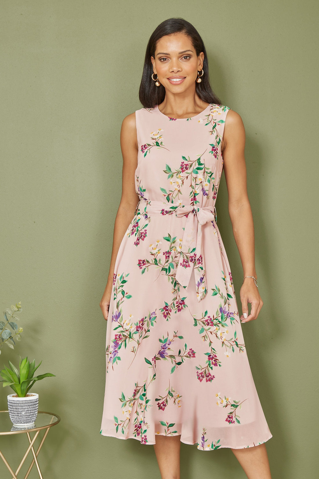 Yumi Blush Floral Print Midi Skater Dress – fit and flare midi dress in blush pink with exclusive in-house designed floral print, self-tie belt at the waist, flattering round neckline and 117.5cm length, 100% polyester shell and lining