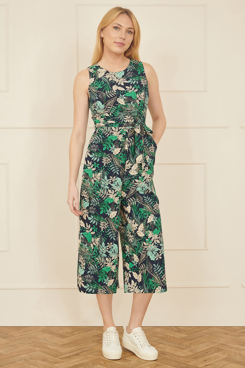 Yumi Green Leaf Culotte Jumpsuit — 100% polyester soft-touch fabric jumpsuit with semi-fitted bodice, round neckline, self-tie belt and culotte trousers, 124cm length