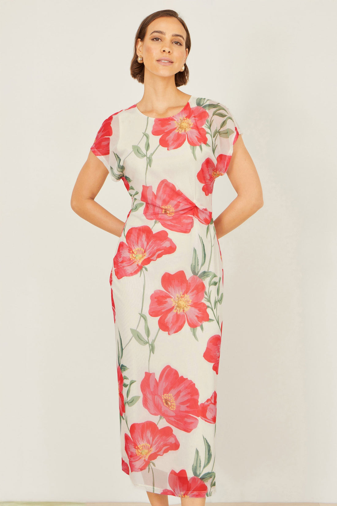 Yumi Ivory Poppy Print Midi Mesh Dress — bold poppy print on ivory background with cap sleeves soft drapey midi silhouette 94% polyester 6% elastane shell with 100% polyester lining 127cm length