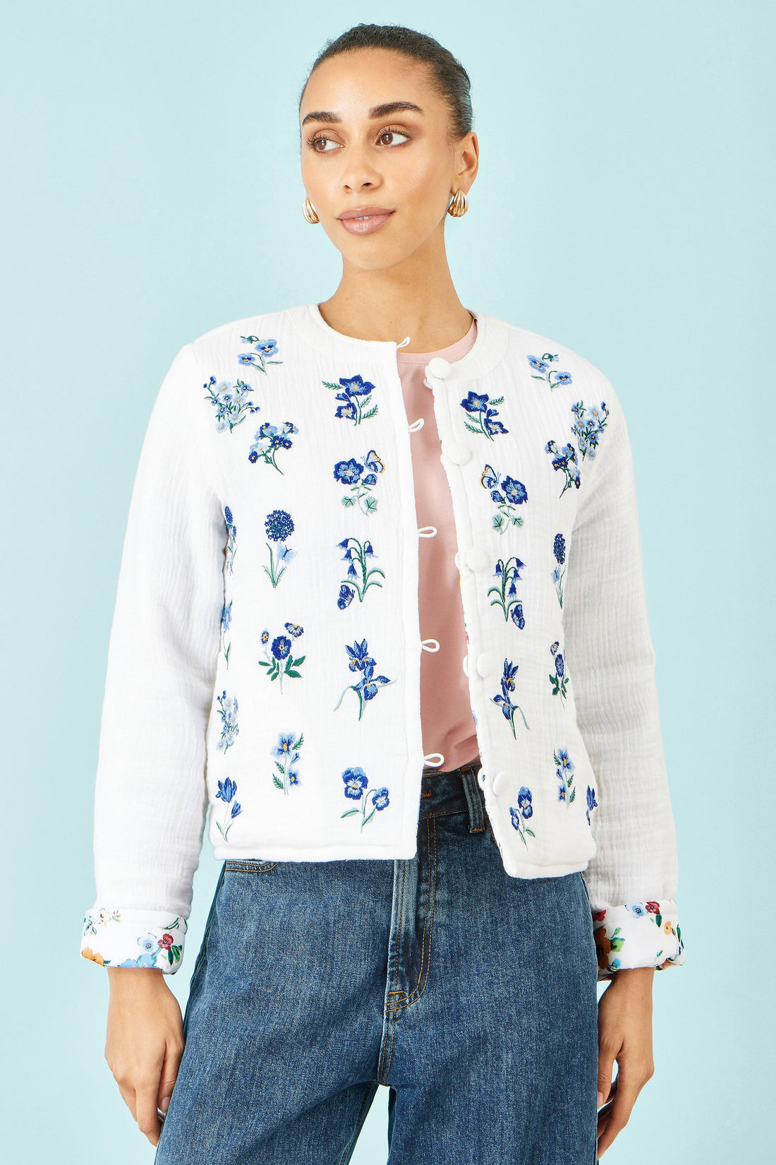 Yumi White Floral Embroidery Reversible Cotton Jacket — delicate floral embroidery and button-through front on a soft breathable cotton jacket