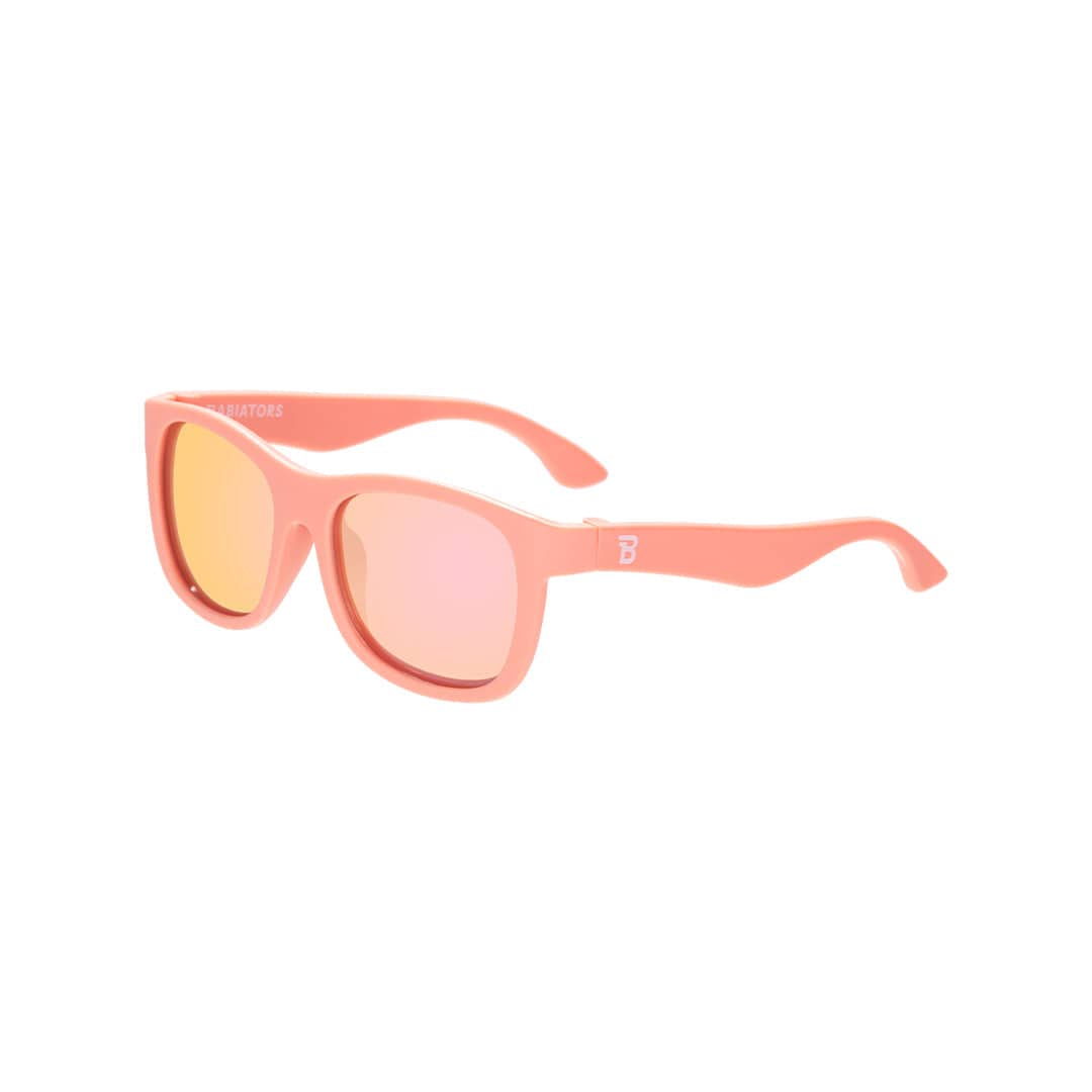 Babiators Polarised Navigator Kids Sunglasses in Perfectly Papaya – front product view showing vibrant orange frames and polarised lenses