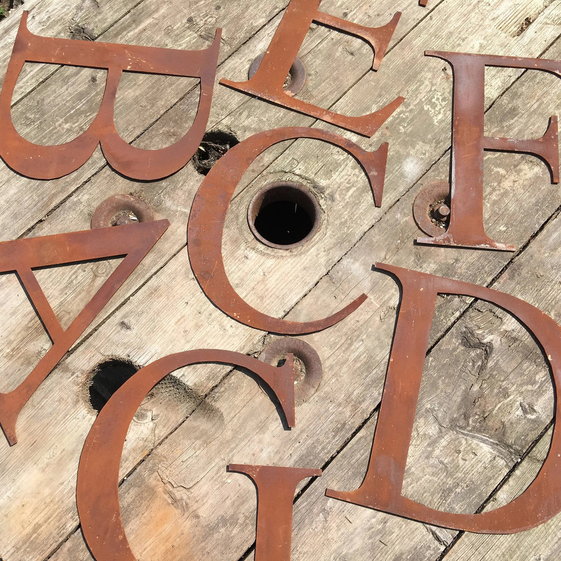 Rustic metal letters by Rustic Warehouse Norfolk — 2mm thick steel signs with authentic aged patina, available in 5 inch and 12 inch sizes for home and garden
