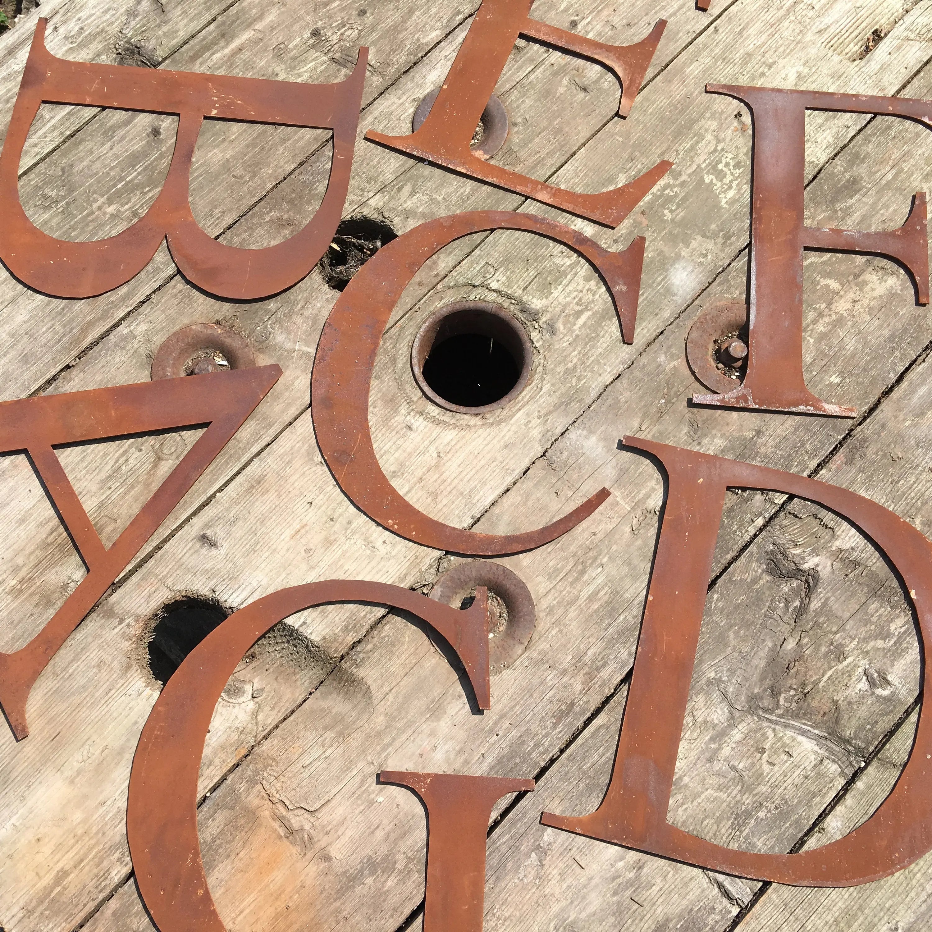 Rustic metal letters by Rustic Warehouse Norfolk — 2mm thick steel signs with authentic aged patina, available in 5 inch and 12 inch sizes for home and garden