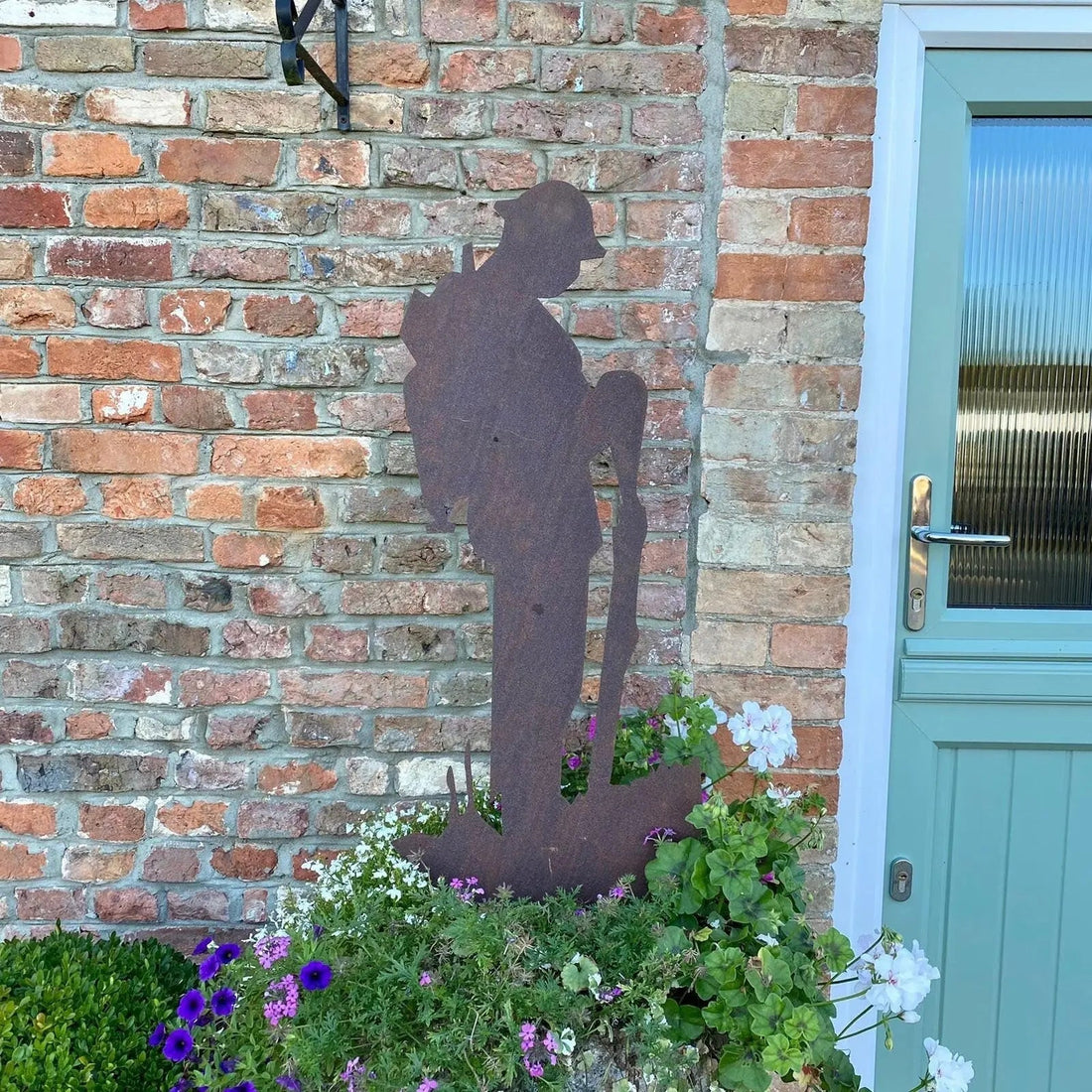Stand to Attention: The Rustic Metal Soldier Garden Statue That Honours History and Transforms Your Outdoor Space