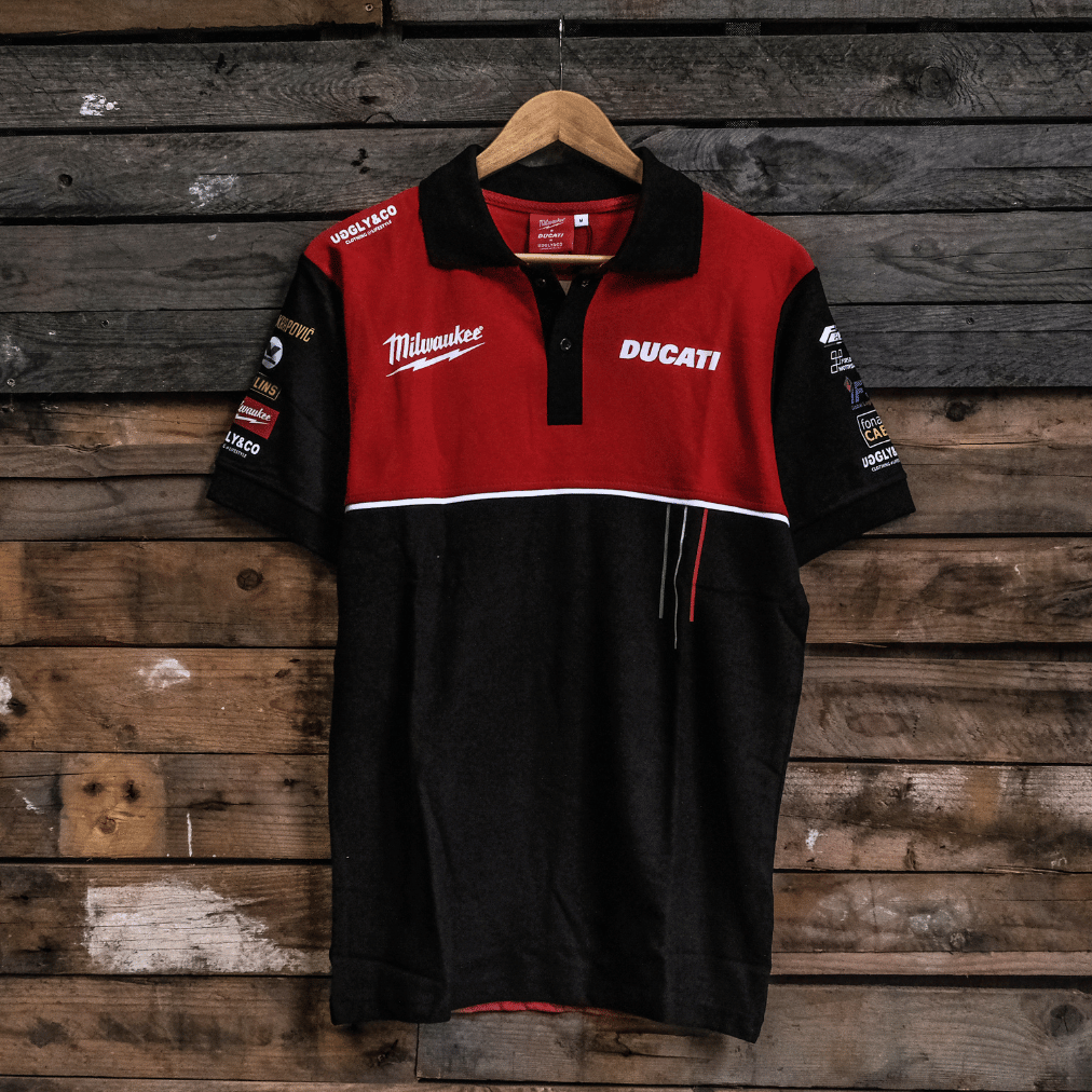 Milwaukee Tools x Ducati Polo Shirt Michael Dunlop Team Wear — official 2025 season racing polo in red and black with Milwaukee Tools and Ducati branding, Ohlins, Valvoline and Akrapovic sponsor logos