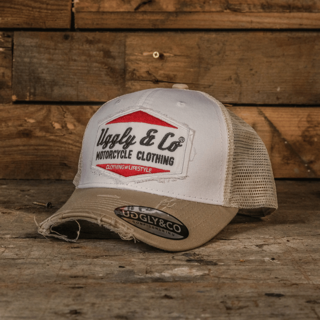 Uggly & Co Original Diamond Trucker Hat in distressed vintage beige – weathered mesh cap with moto-inspired diamond graphic for bikers and motorsport fans