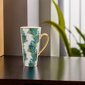Orsina Winter Palm Latte Mug – Tall Ceramic Coffee Cup with Gold Trim