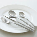 Orsina Avie 16-Piece White Faux Marble Cutlery Set | Silver Flatware