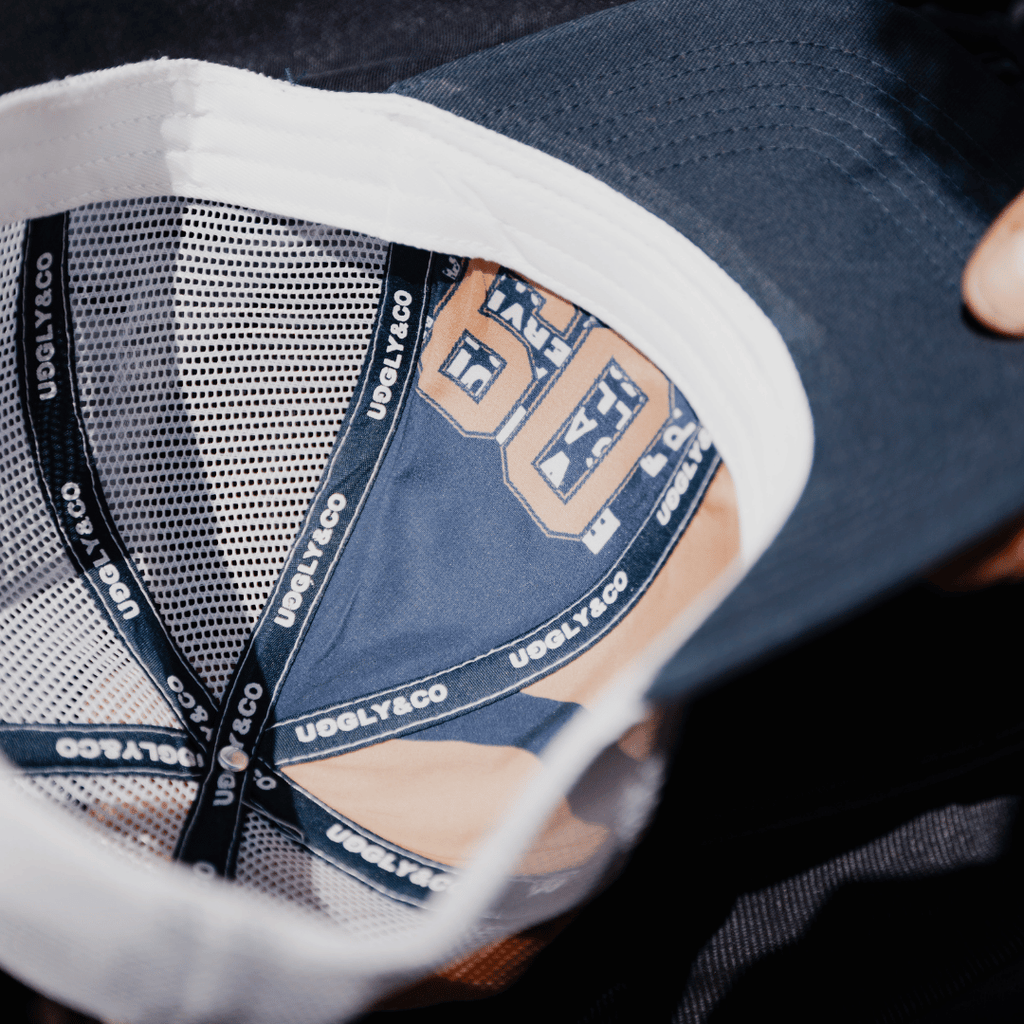 Uggly and Co Navy Parts & Spares '09' Vintage Moto Trucker Hat