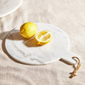 Orsina Kindia Round Marble Serving Board – White & Grey Paddle
