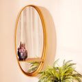 Orsina Avento Gold Oval Wall Mirror with Shelf – Modern Vanity Decor