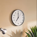 Orsina Elko Oval Wall Clock – Modern Silver Metallic Minimalist Decor