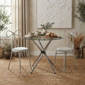 Orsina Afton Round Glass Dining Table – Silver Metal Cross Base