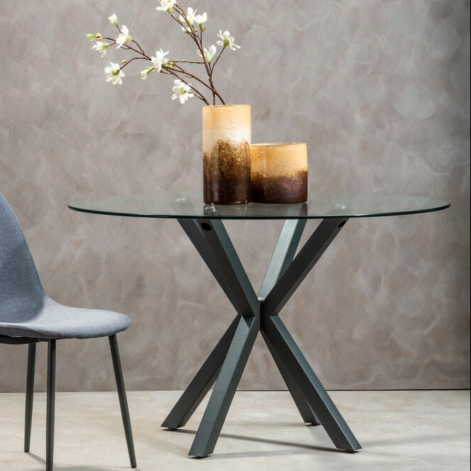 Orsina Salford Round Glass Dining Table | Grey Metal Starburst Base