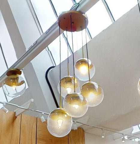 Orsina Revive Gold 5-Light Pendant – Glass Globe Modern Chandelier