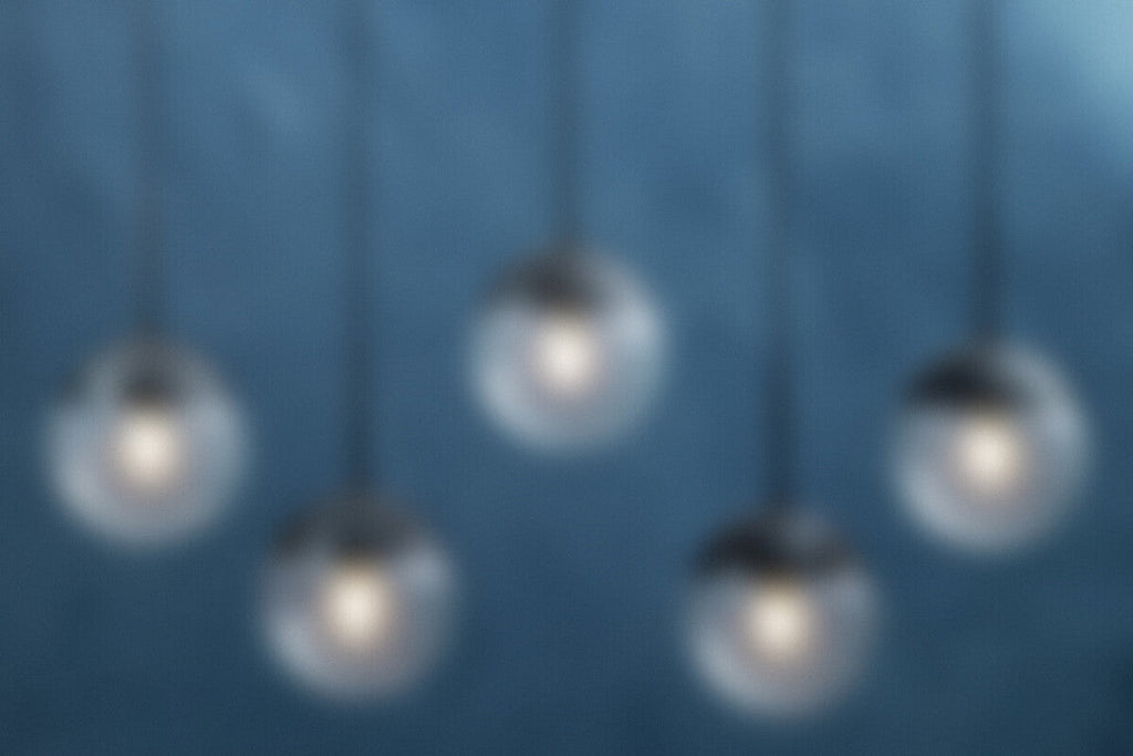Orsina Revive 5-Light Clear Glass Globe Pendant Light – Black Finish