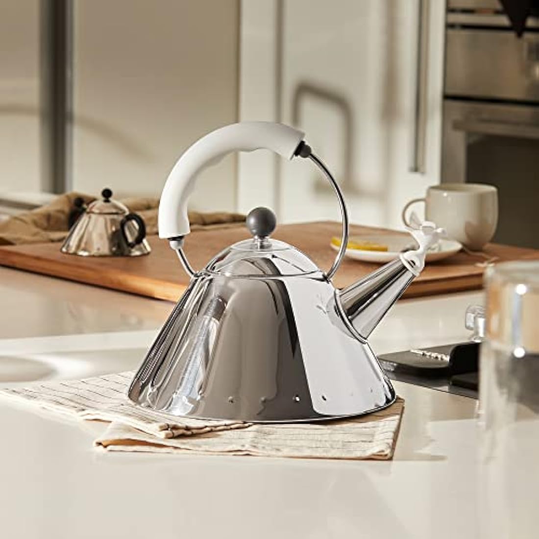 Alessi Whistling Water Kettle – Stainless Steel & White by Michael Graves