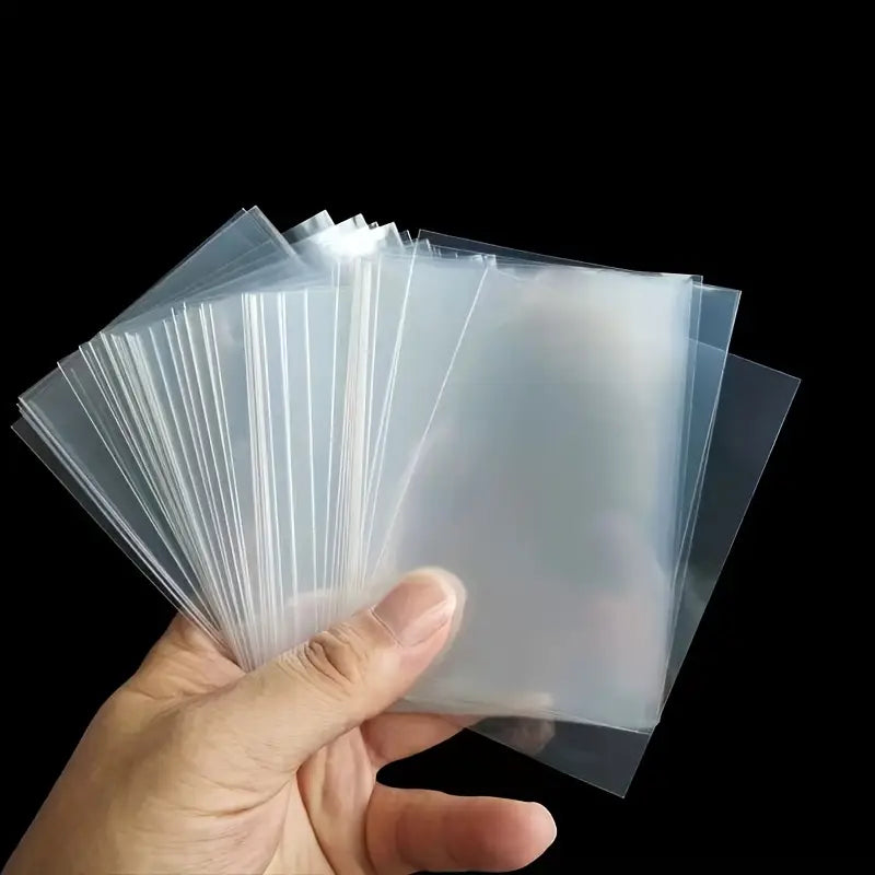 Snaps Standard Card Sleeves | 100 Clear Protective Sleeves 66x91mm