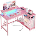 Bestier Pink L-Shaped Gaming Desk with LED Lights and Power Outlets