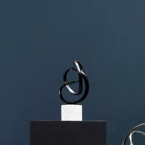 Orsina Mirano Knot Sculpture | Black Nickel & White Marble Base