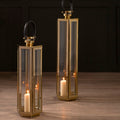 Orsina Gold Finish Lantern with Leather Handle – Medium Glass Pillar