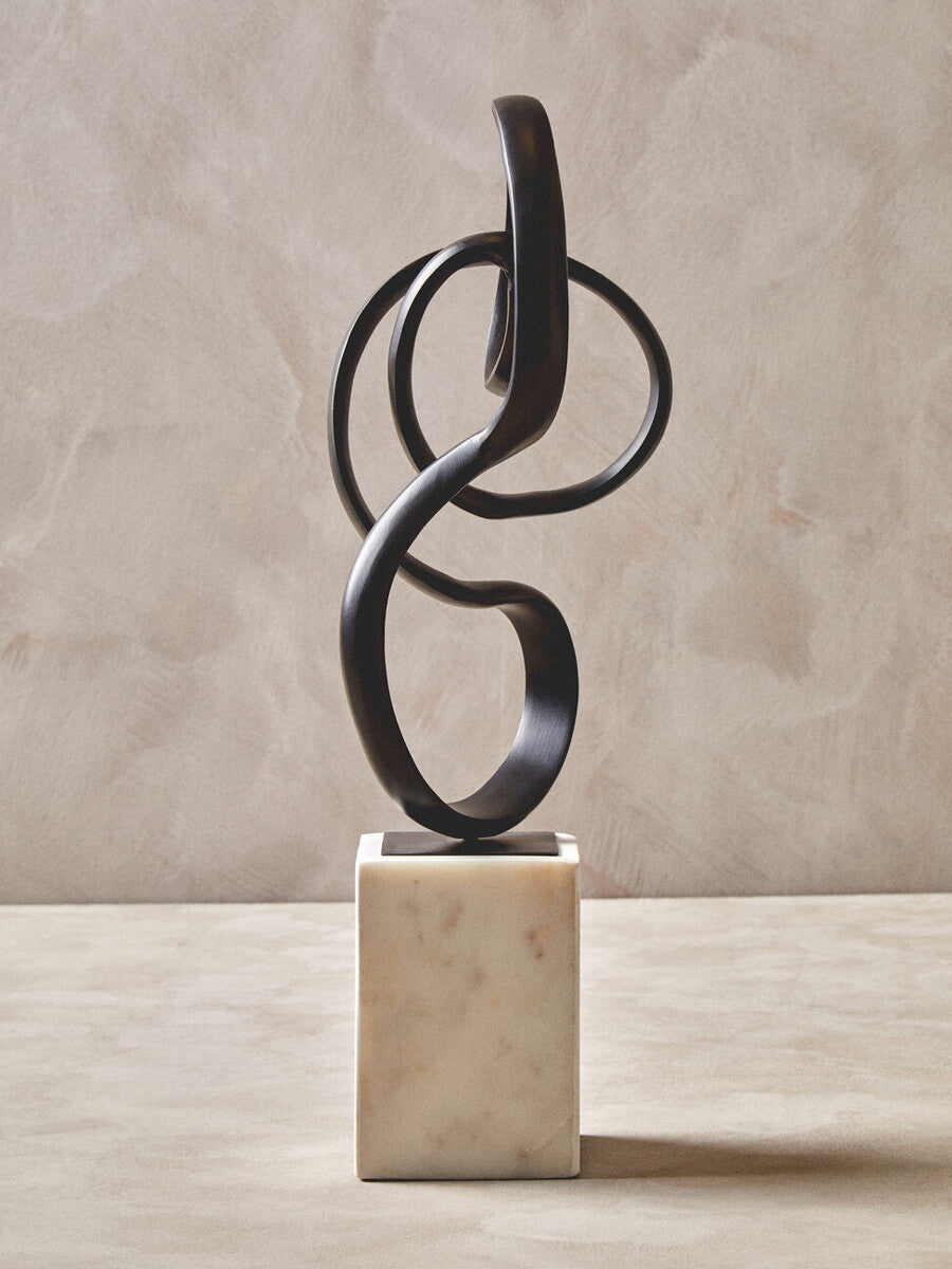 Orsina Mirano Black Aluminium Knot Sculpture on White Marble Base