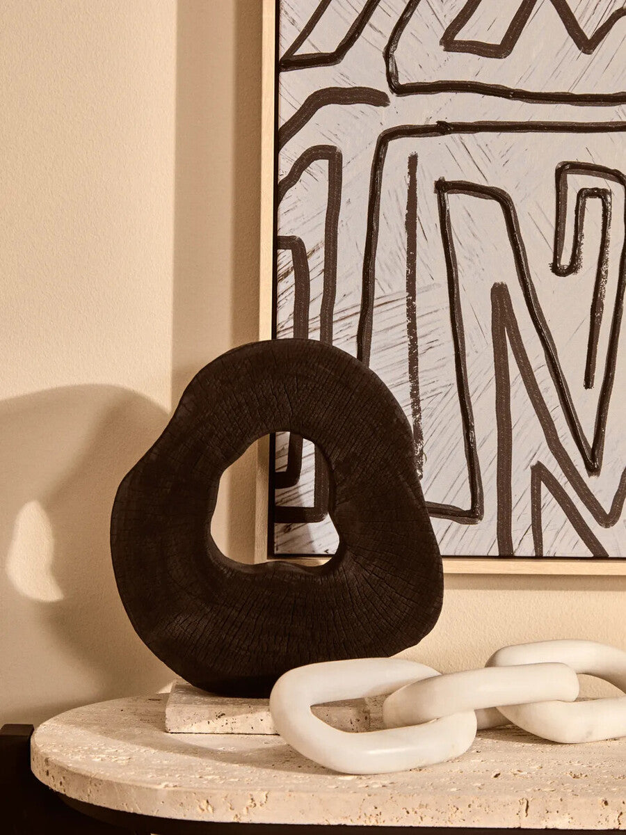 Orsina Tibor Black Mango Wood Sculpture with Travertine Base