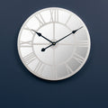 Orsina Kent Silver Mirrored Wall Clock | Skeleton Roman Numeral Design