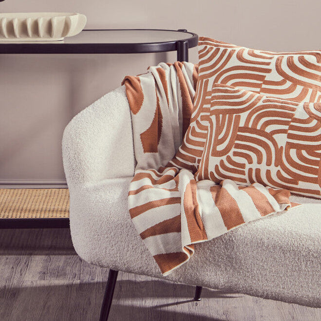 Orsina Bosie Ozella Knitted Throw – Natural and Terracotta Abstract