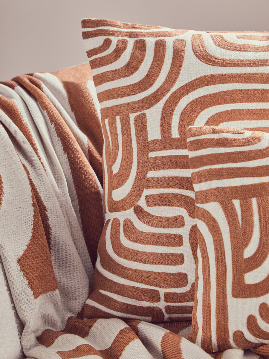Orsina Bosie Ozella Knitted Throw – Natural and Terracotta Abstract