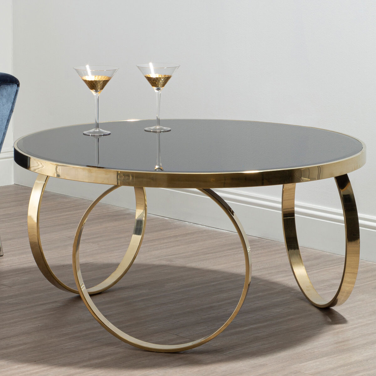 Orsina Ragusa Round Mirrored Black and Gold Stainless Steel Coffee Table