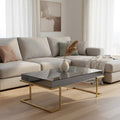 Orsina Kaso Coffee Table – Grey Mirrored Glass & Gold Sledge Base
