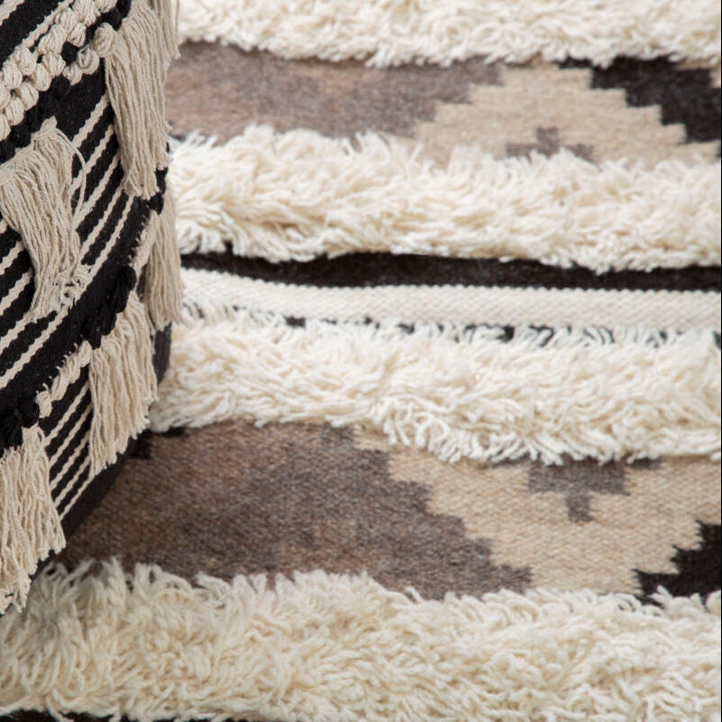 Orsina Cefena Black Pouffe – Woven Boho Ottoman with Tassels