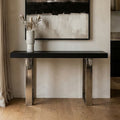 Orsina Kerala Console Table – Black Wood and Glass with Silver Legs