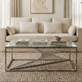 Orsina Amella Glass Coffee Table – Silver Finish Sculptural Steel Frame