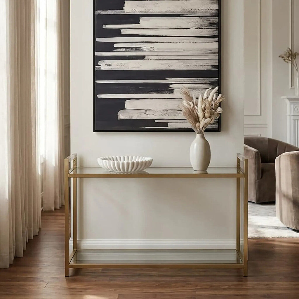 Orsina Matte Gold Stainless Steel Console Table with Clear Glass Shelf