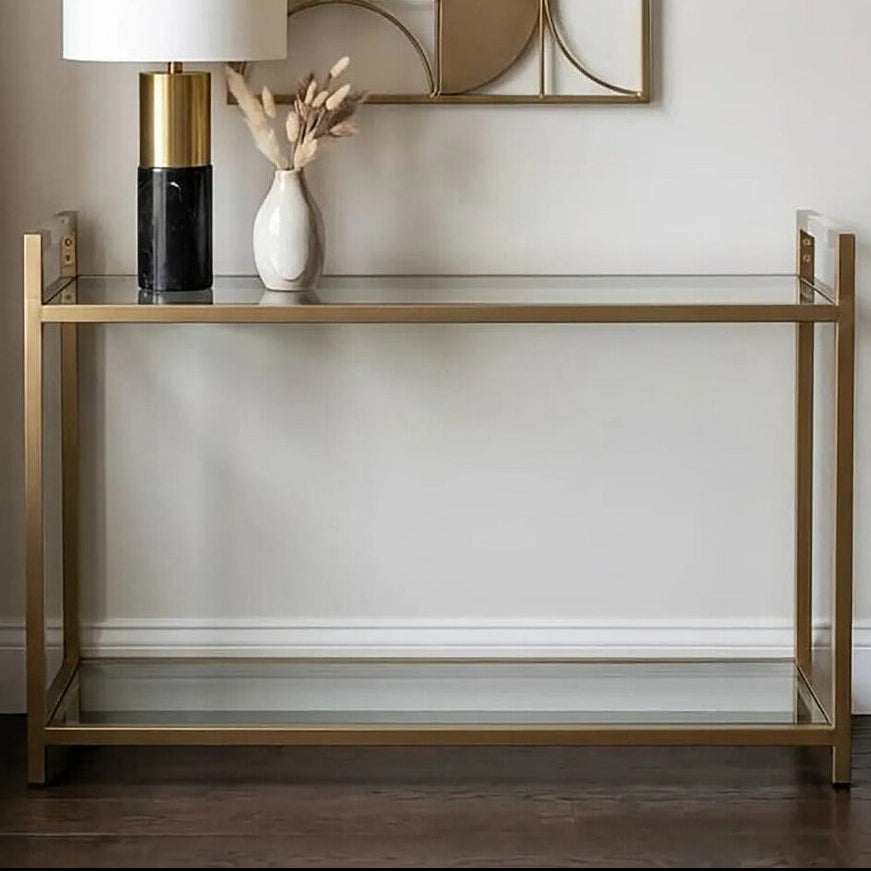 Orsina Matte Gold Stainless Steel Console Table with Clear Glass Shelf