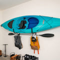 StoreYourBoard Kayak Wall Mount | Heavy-Duty Folding Rack with Paddle Hanger