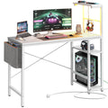 Bestier 113CM Corner Computer Desk with LED Lights and Power Outlets
