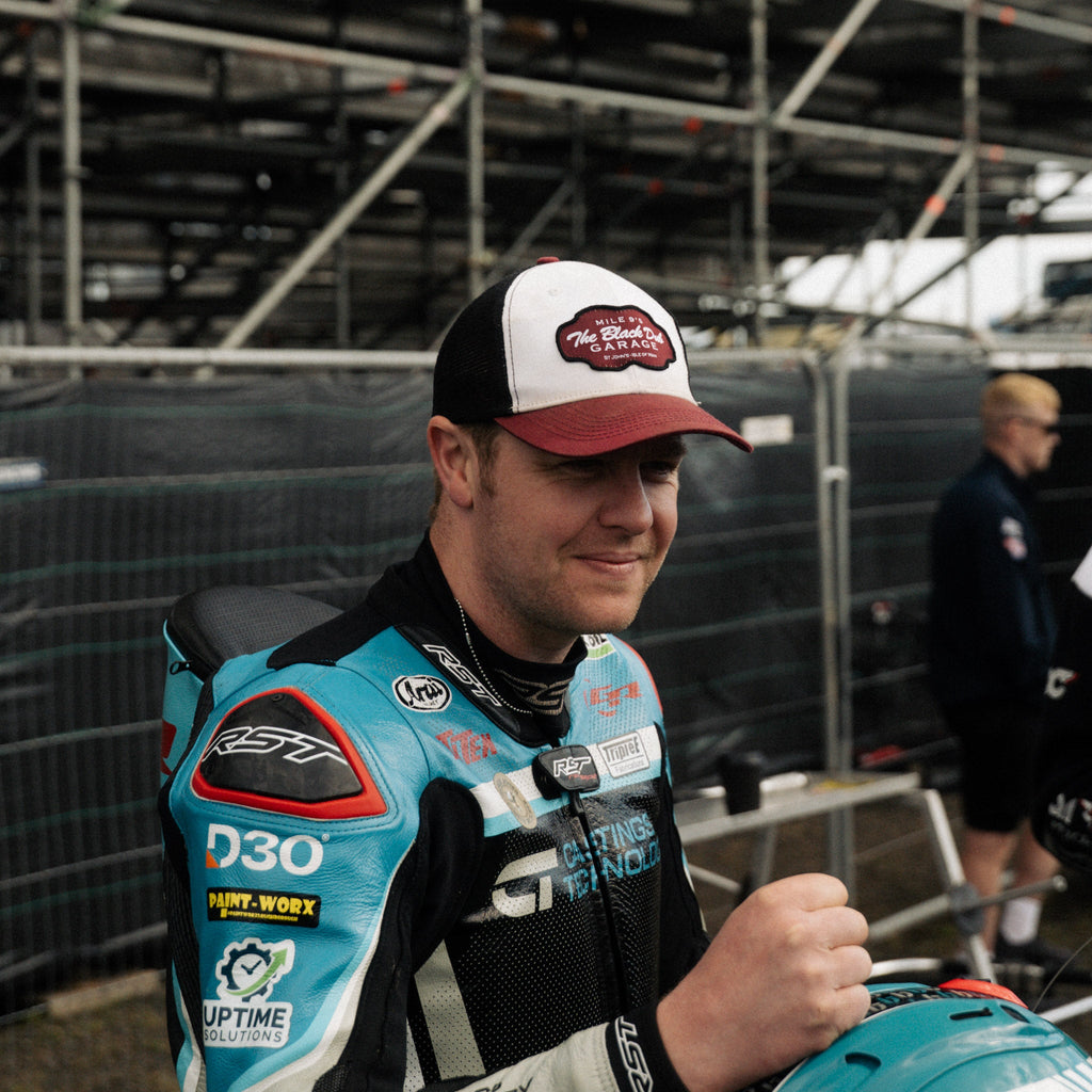 Uggly and Co Black Dub Garage Trucker Hat – Burgundy Isle of Man TT