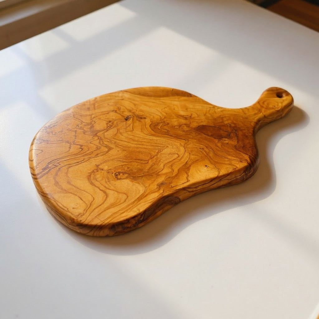 Olive Wood Medium Cutting Board with Handle 39 Handmade Olive Wood Round Freeform Charcuterie Board with Handle | Large Live Edge Cheese & Antipasti Serving Board | Bold Natural Grain | 33–46 cm